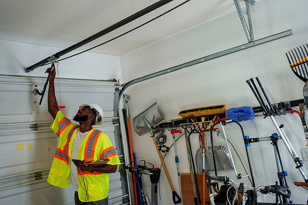 Professional Garage Door Panel Replacement technician working in Henry County County, IA